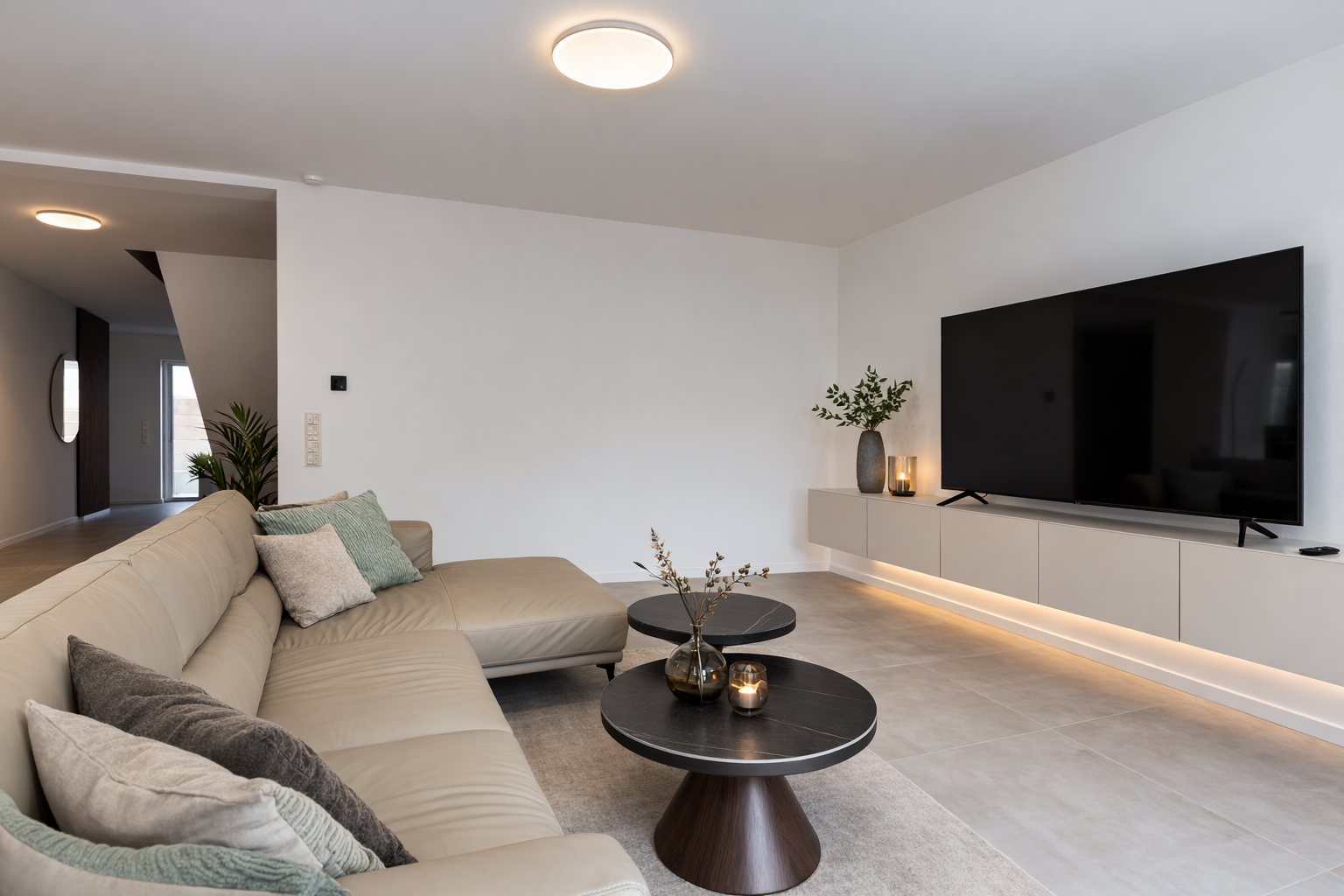 Living room with entertainment center at TLA Kaiserslautern Sandaecker 46