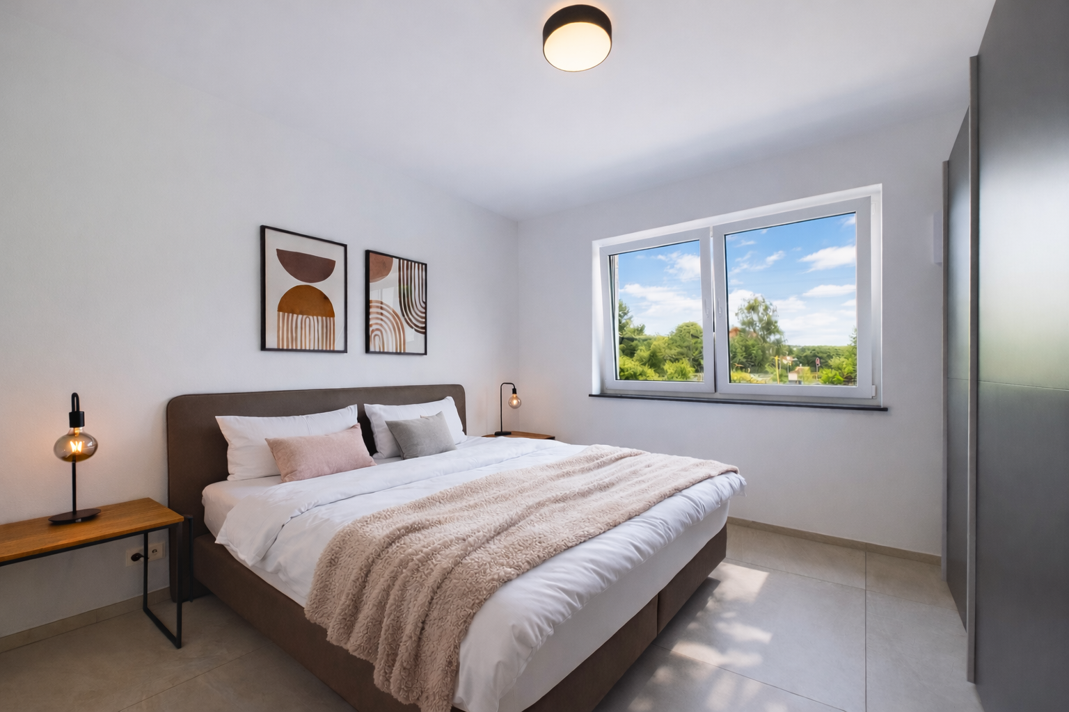 Comfortable bedroom with large bed and spacious closet at TLA Ramstein 30/1